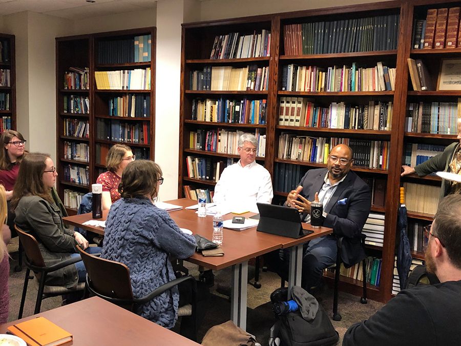 Photo of McDaniels and fellow Rose Library curator Randy Gue (left) worked with students in a Public Humanities graduate class this year on an upcoming exhibit on public housing in Atlanta.