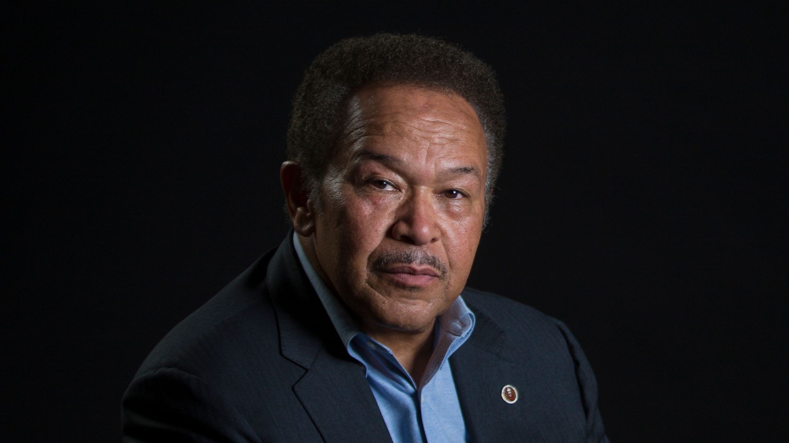 Seated portrait of Dr. Robert Franklin