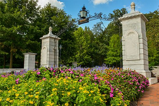 The Emory gate with flowers