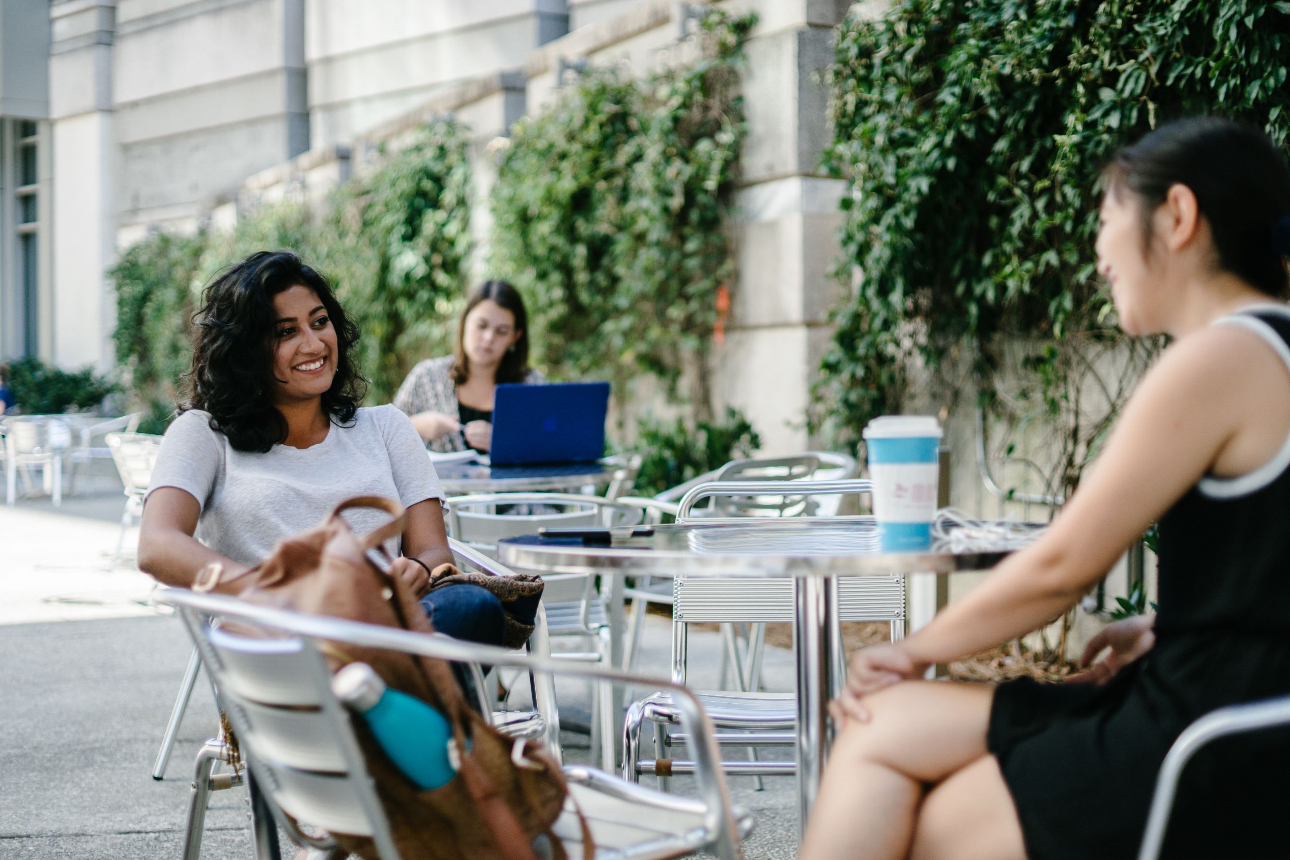 Two students talking outside