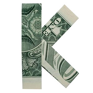 one dollar bill folded into a K