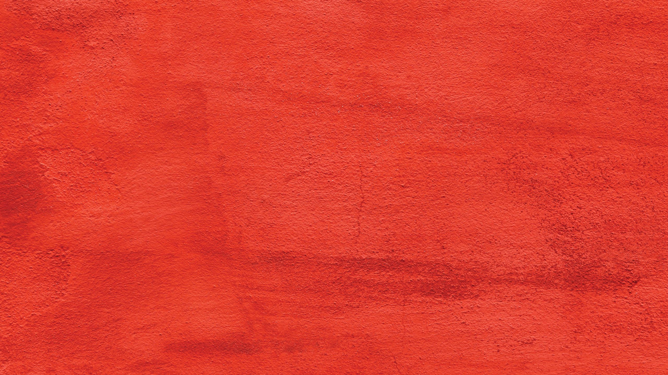 a background photo of a red painted concrete wall.