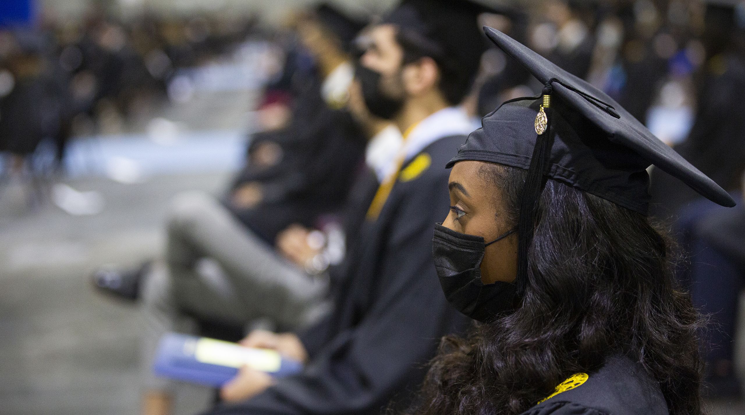 Graduates watching the ceremony
