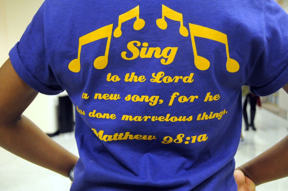 A close up of a VOIS t shirt: "Sing to the Lord a new song, for he has done marvelous things."
