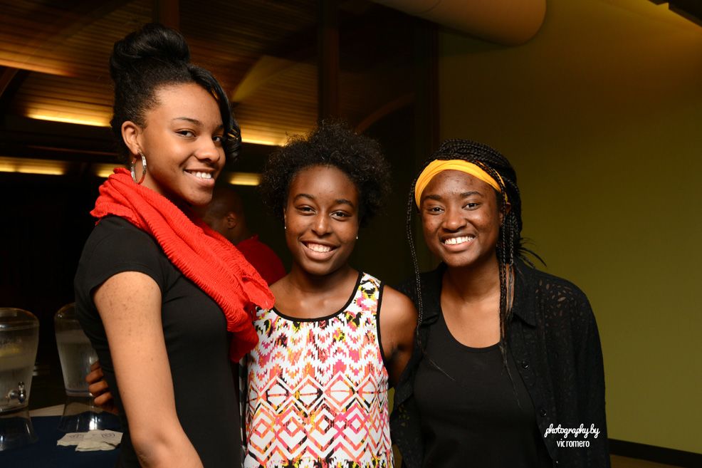 Three VOIS members pose for a photo
