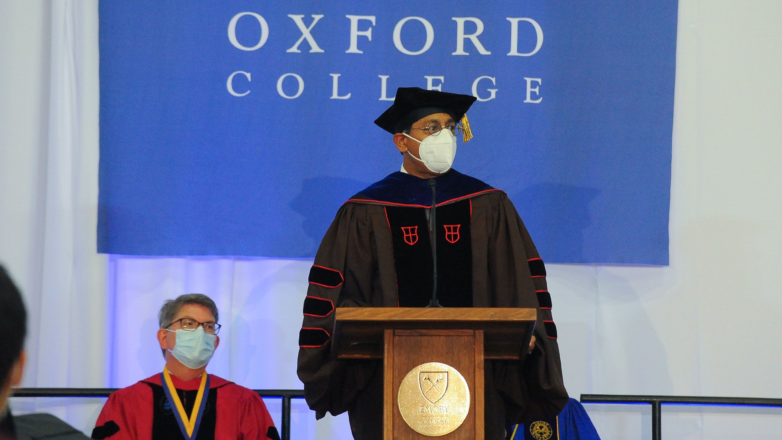Provost Ravi Bellamkonda at the podium