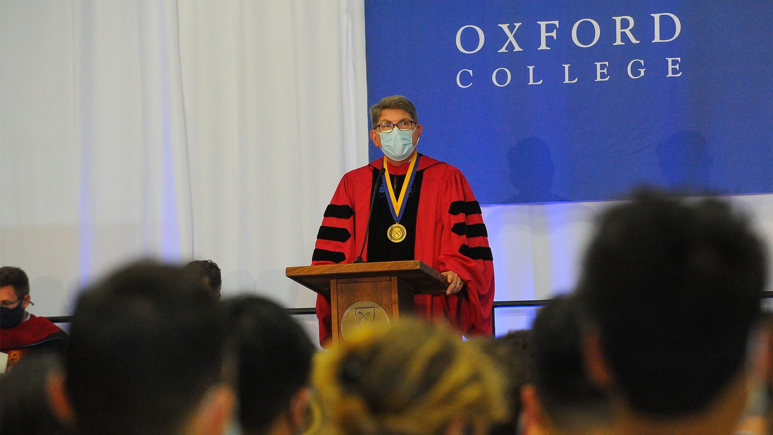 Oxford Dean Douglas Hicks at the podium
