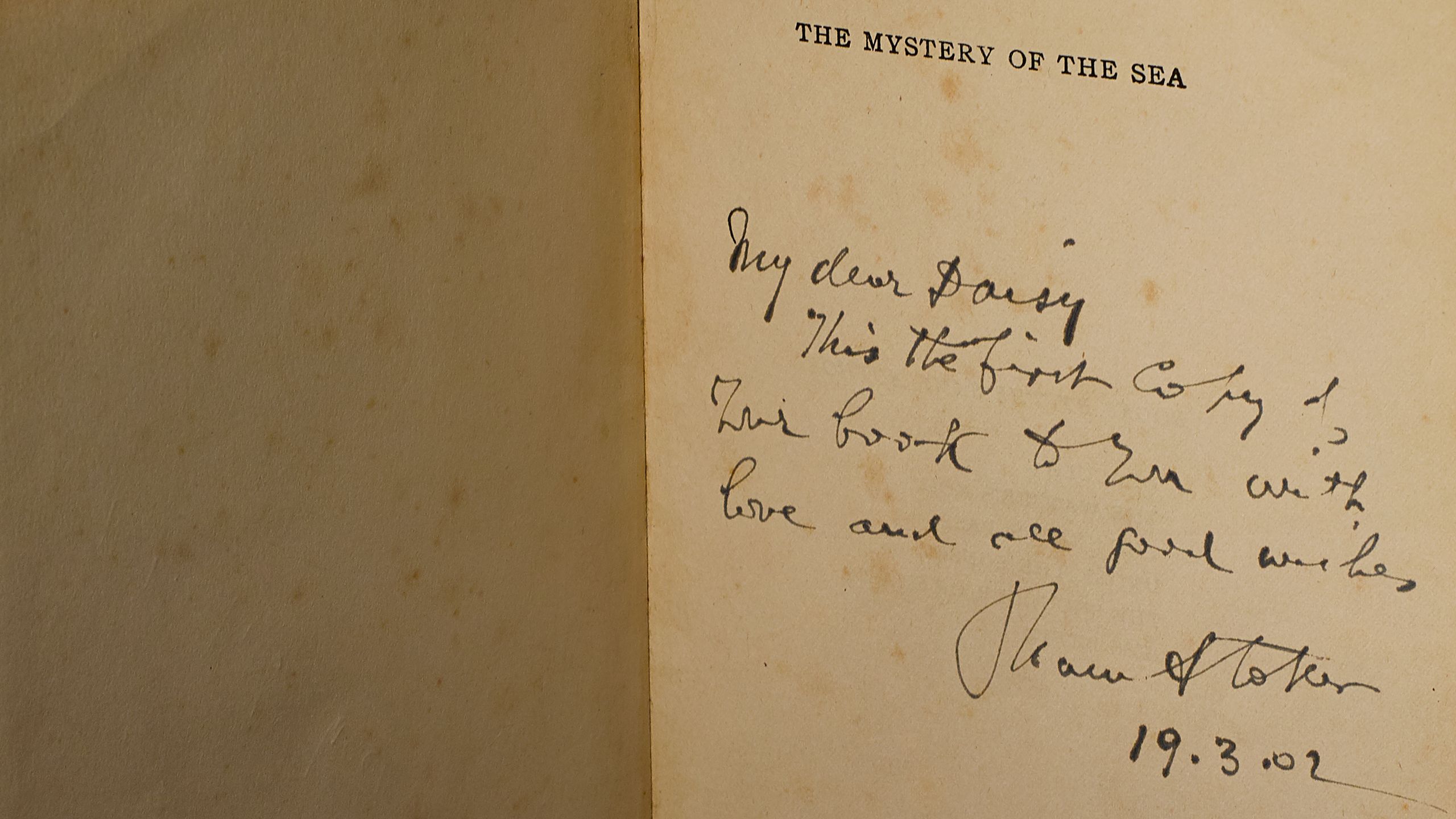 Handwritten inscription page from "The Mystery of the Sea"