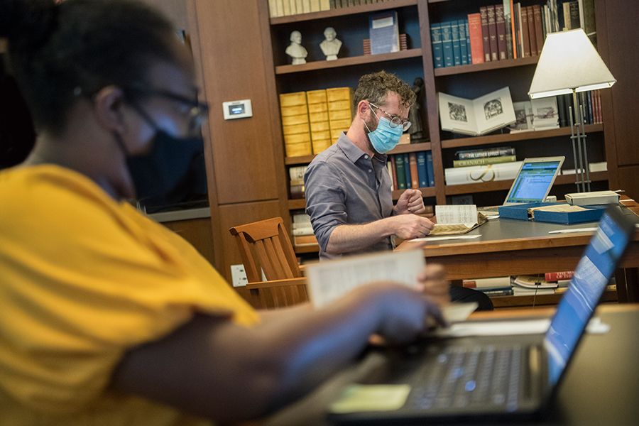 Jesse Karlsberg working with a colleague
