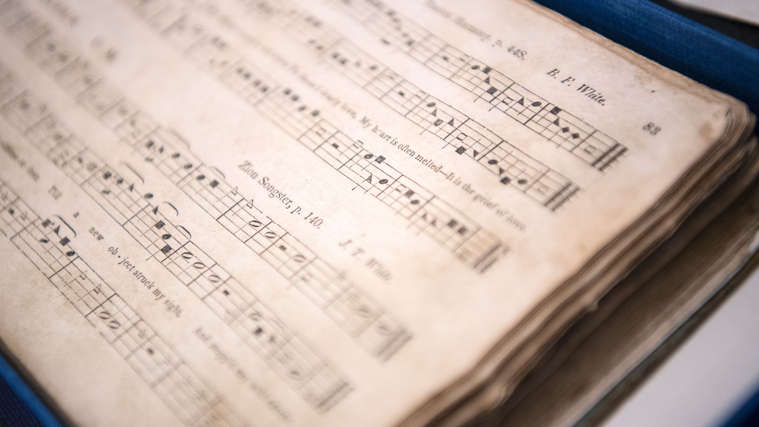 close up image of old song book