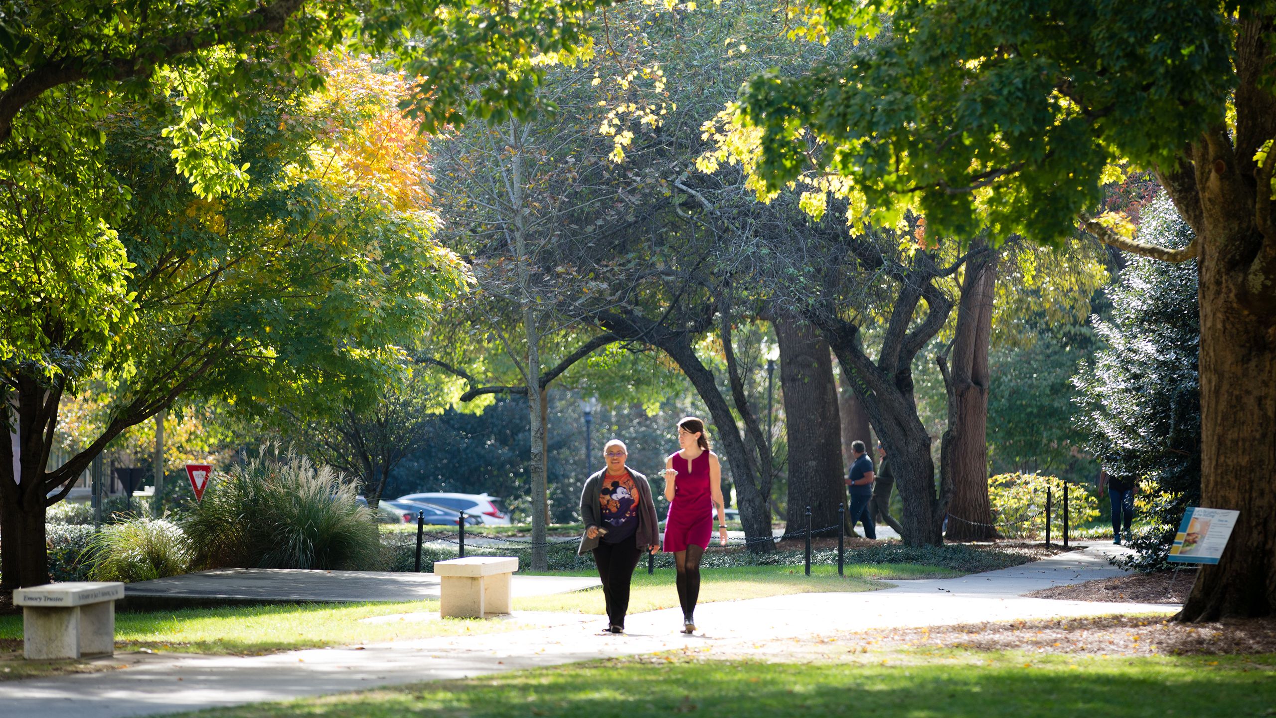 Students walking on sidewalk