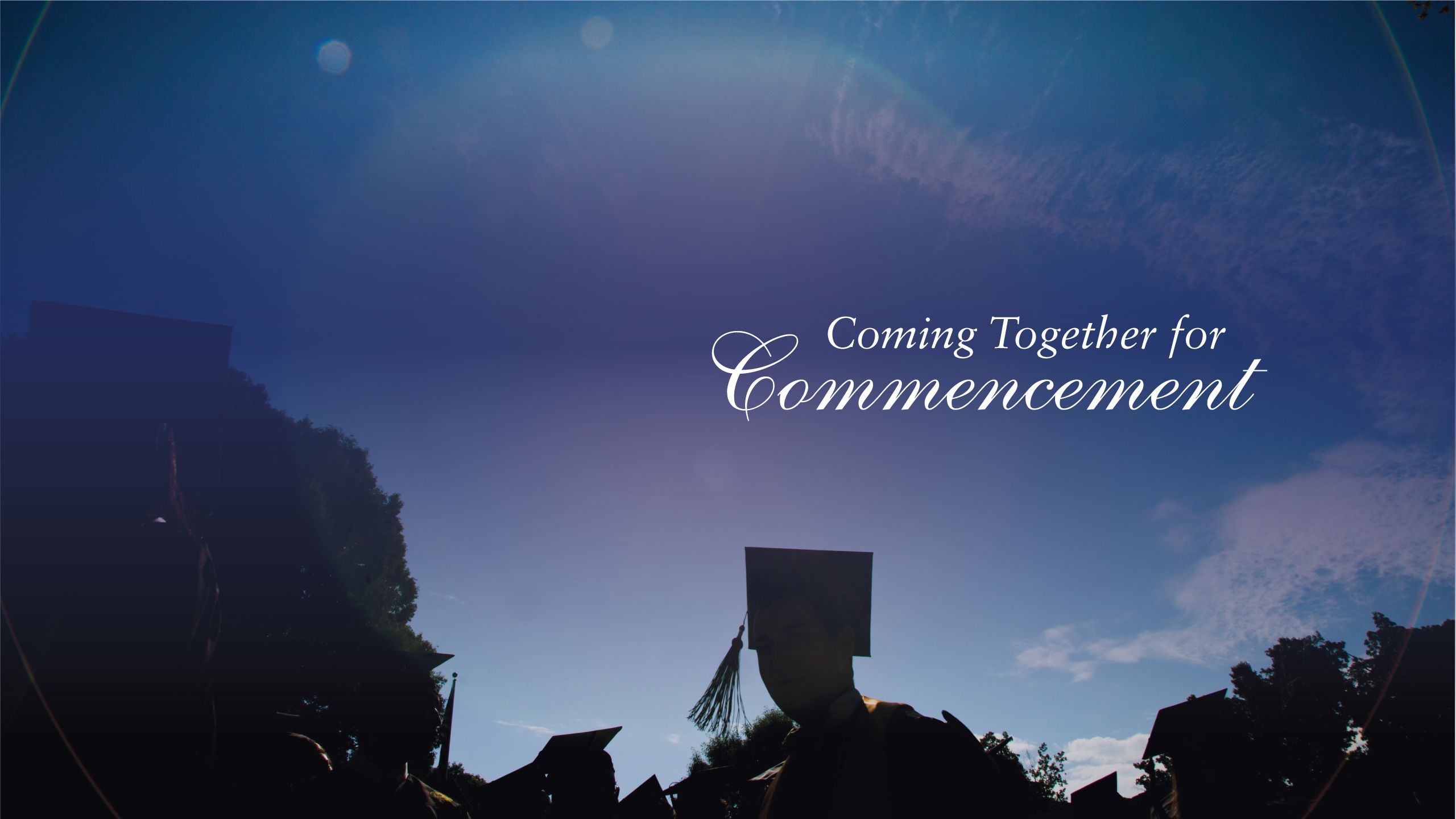 A close up of the Emory President's Medal on the Commencement podium, with a blue overlay and the text "Coming Together for Commencement"