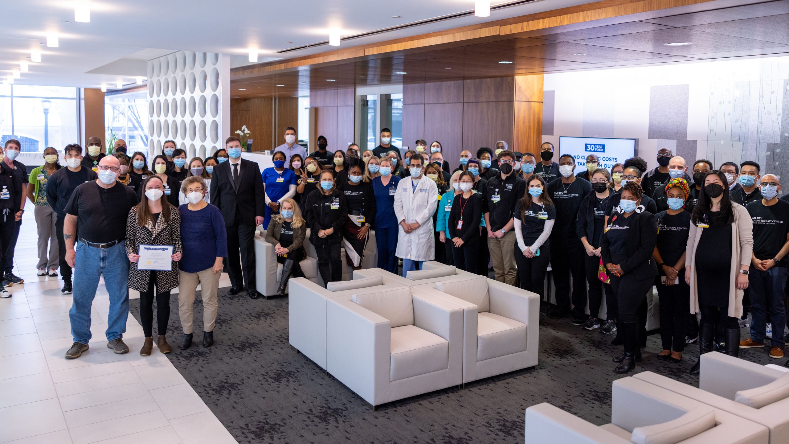 Megan Smith, family, physicians, and staff at the bell ringing event