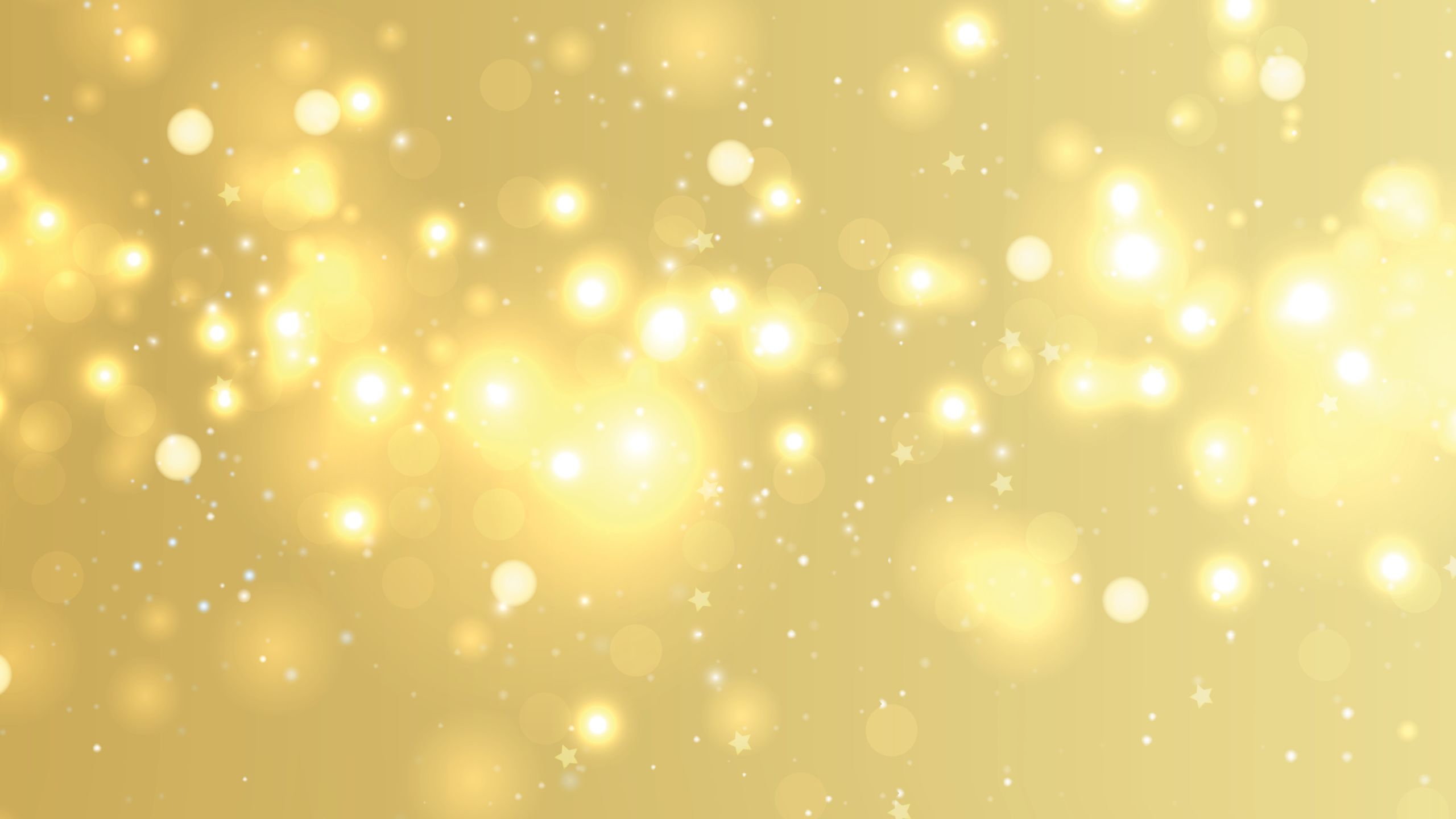 a stock image of a glittery gold background.