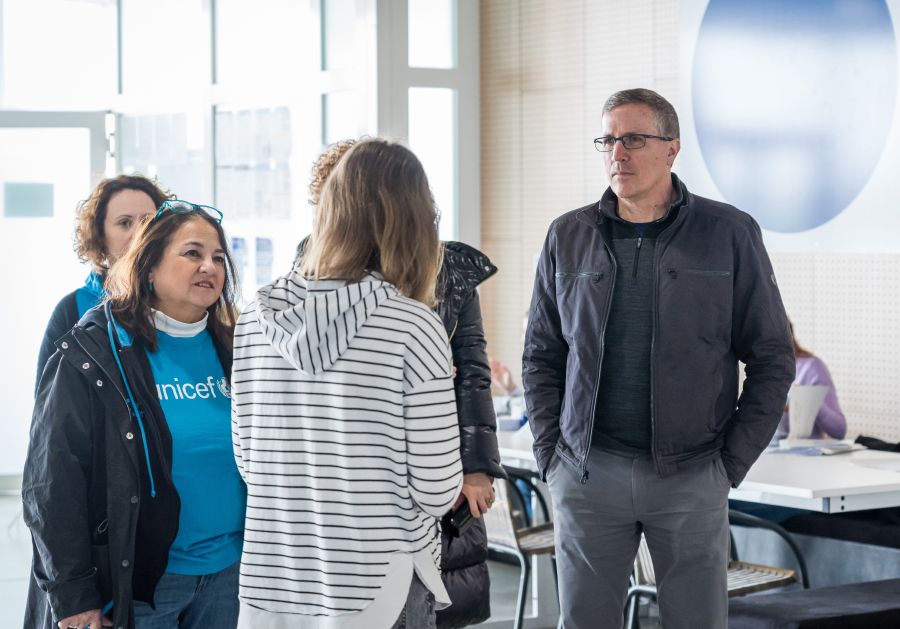Michael Nyenhuis with UNICEF workers at a Blue Dot Center