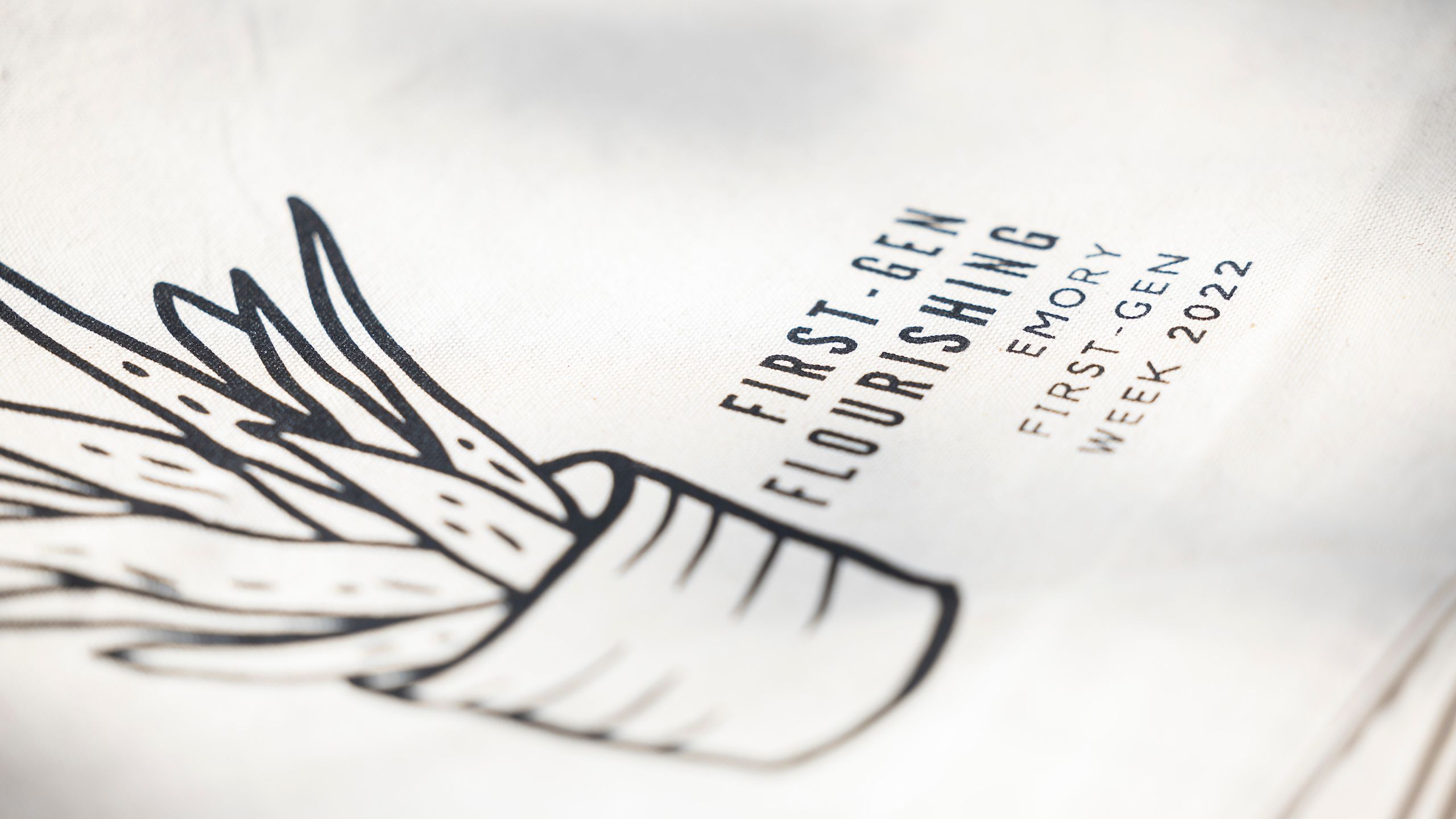 Close-up of a sign reading First-Gen Flourishing