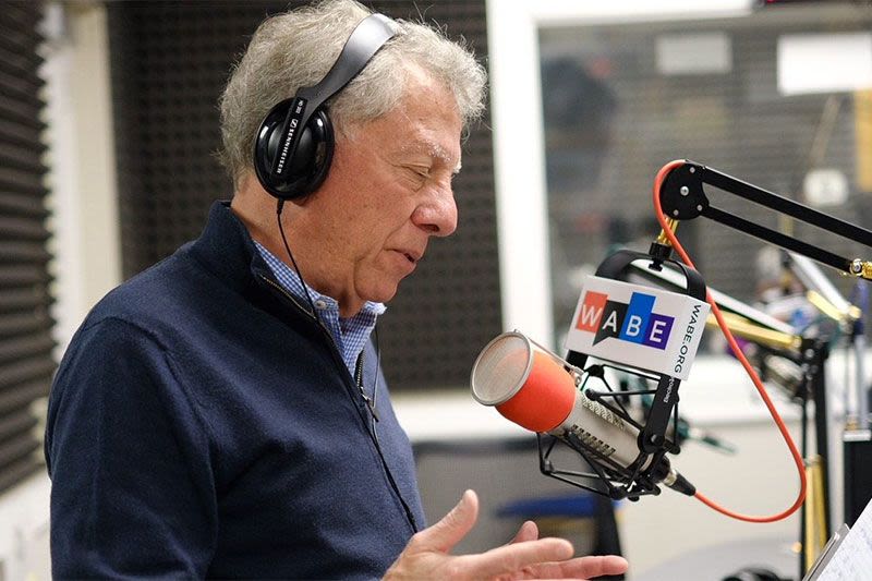 Hank Klibanoff at a microphone