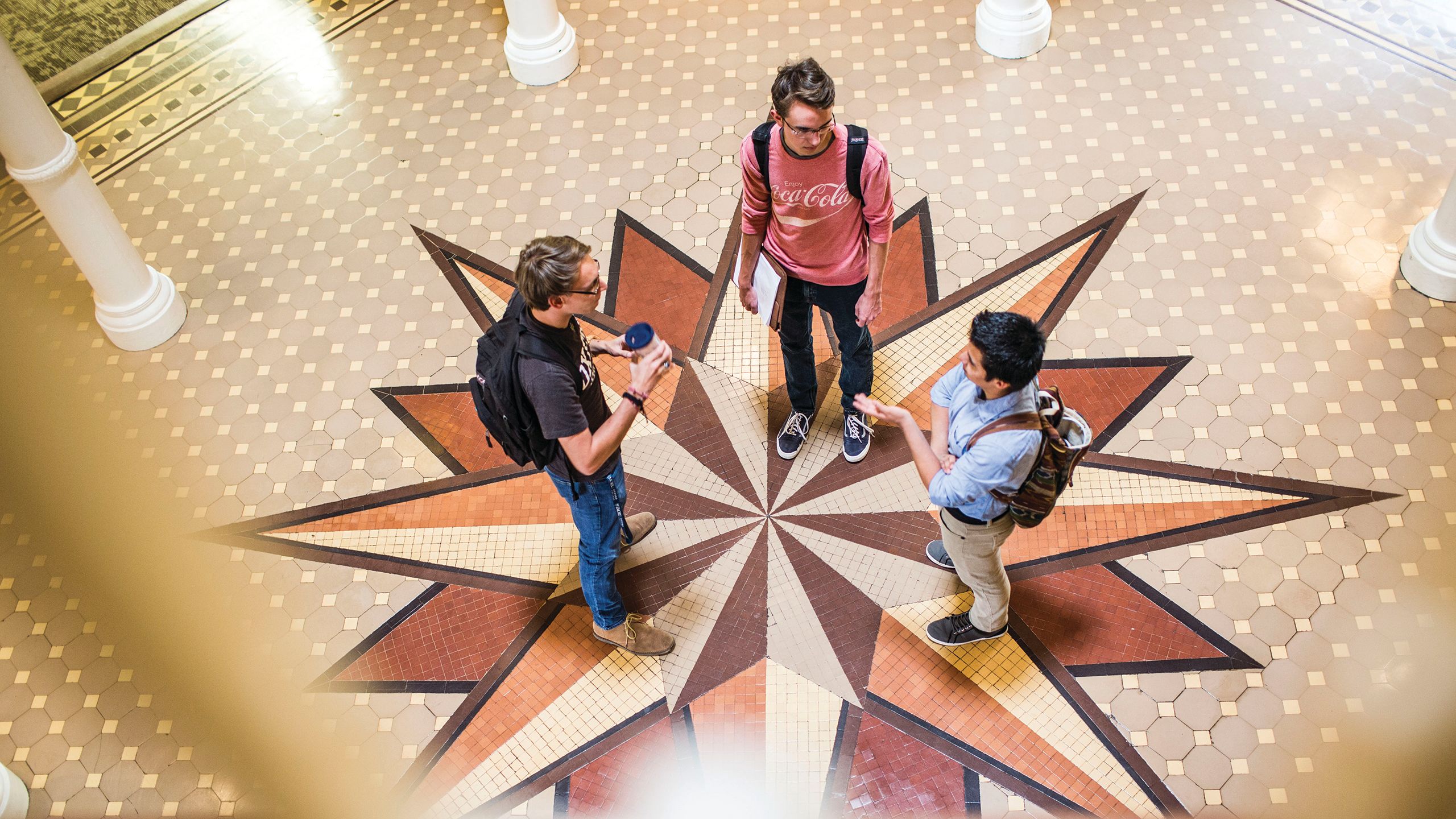 Students standing in hallway talking