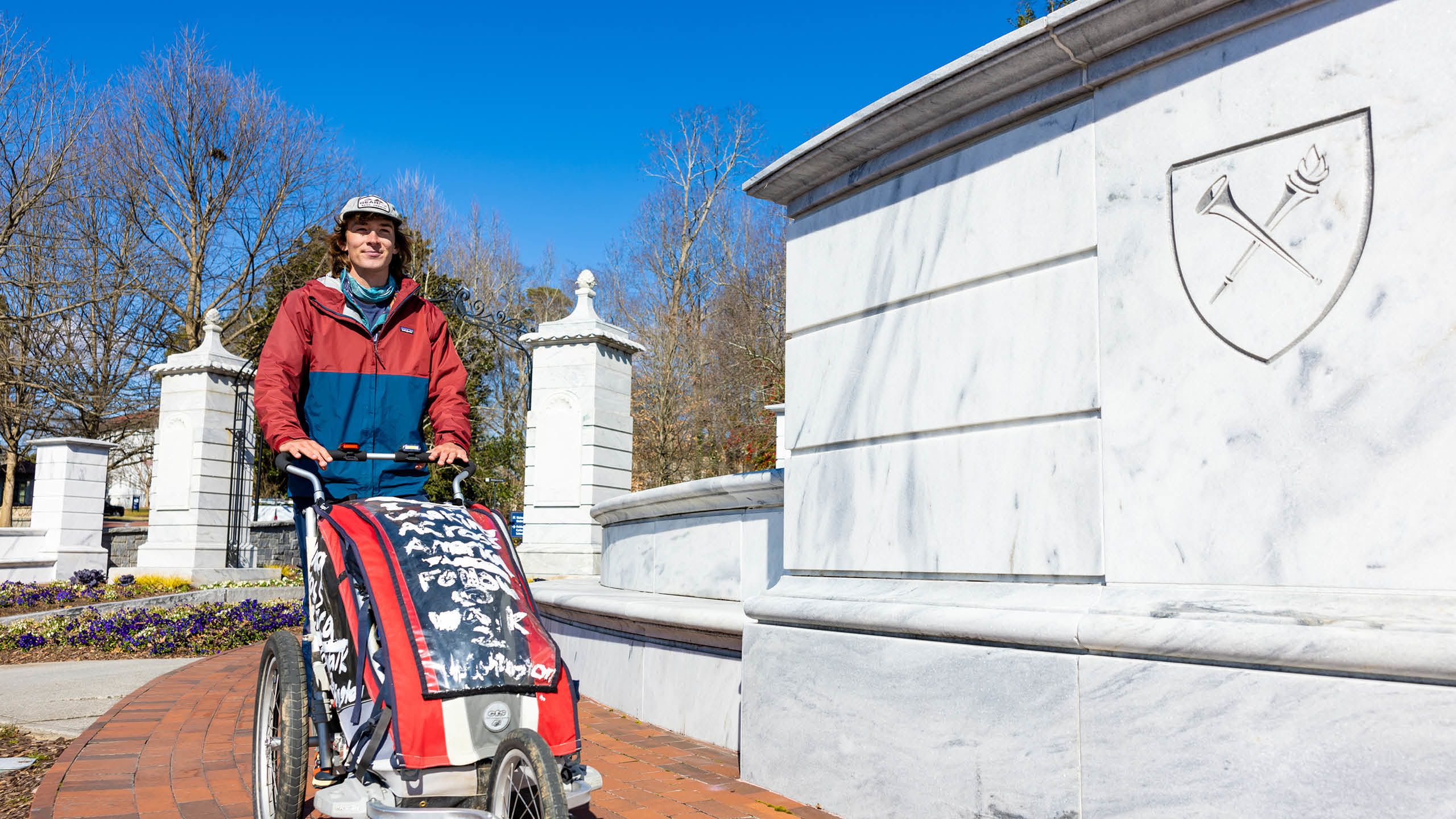 Photo of Holden Ringer with his walking stroller at Emory's Atlanta campus