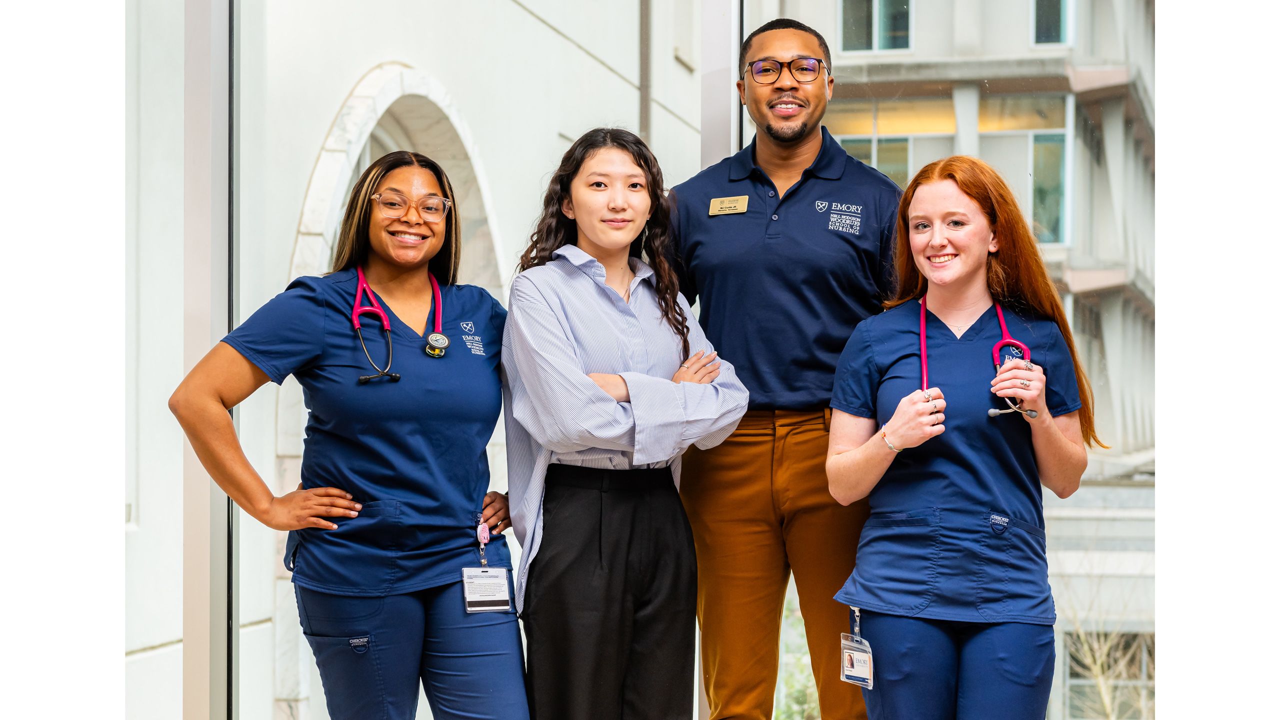Four confident students at the School of Nursing