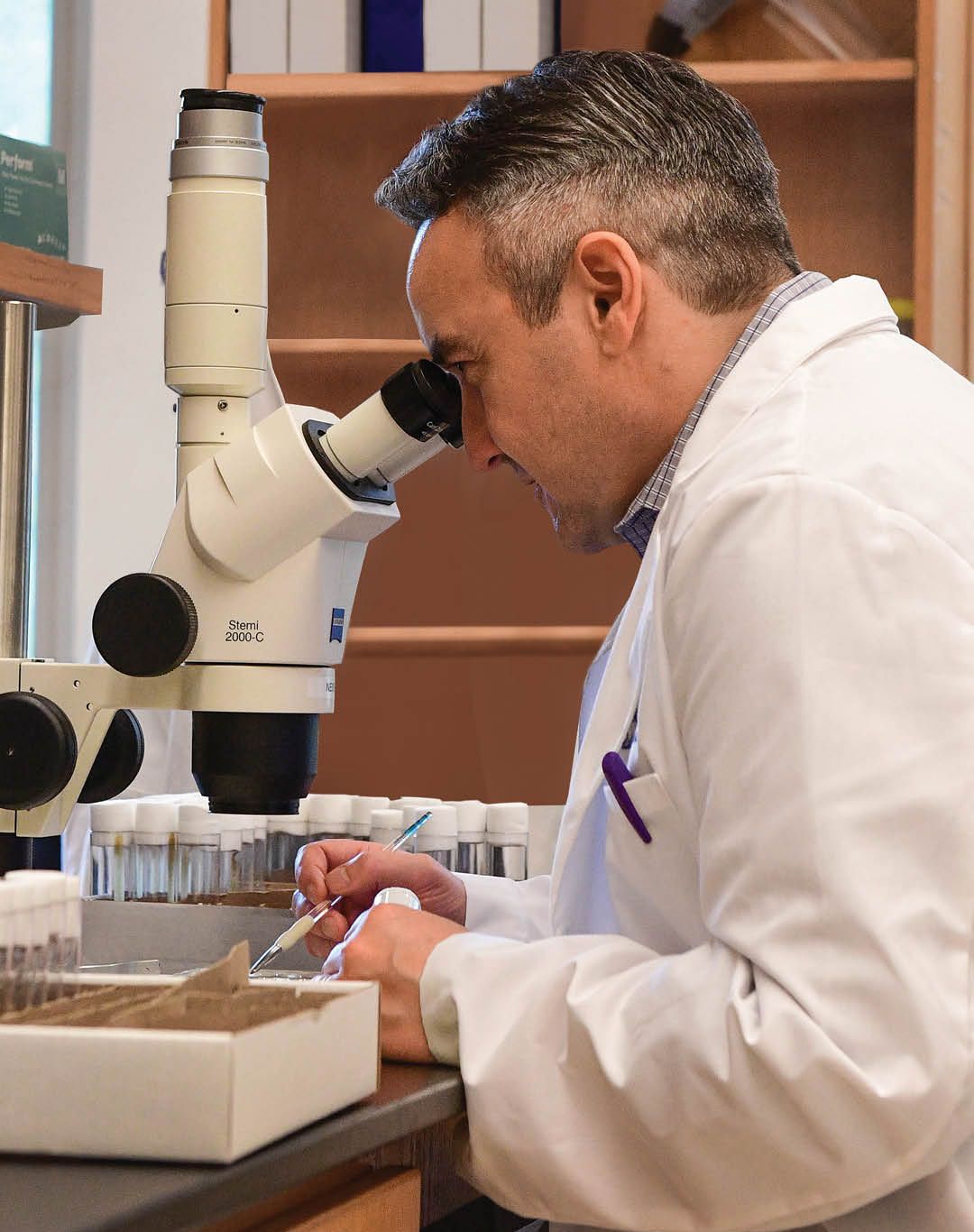 Rheinallt Jones working in research lab