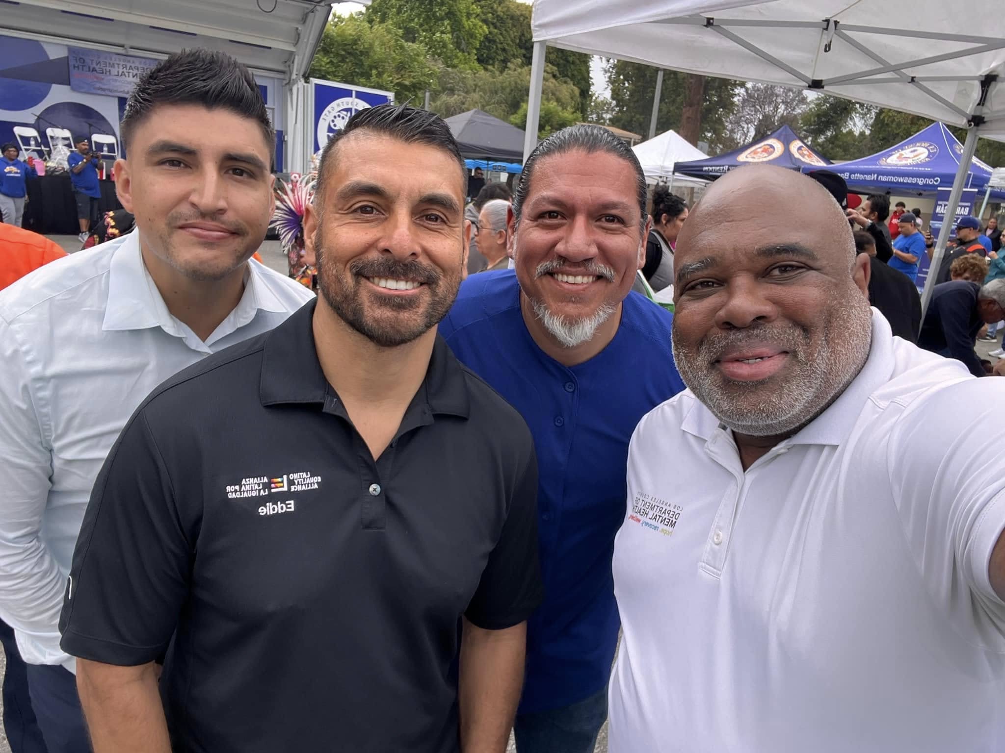 Curley Bonds with three colleagues