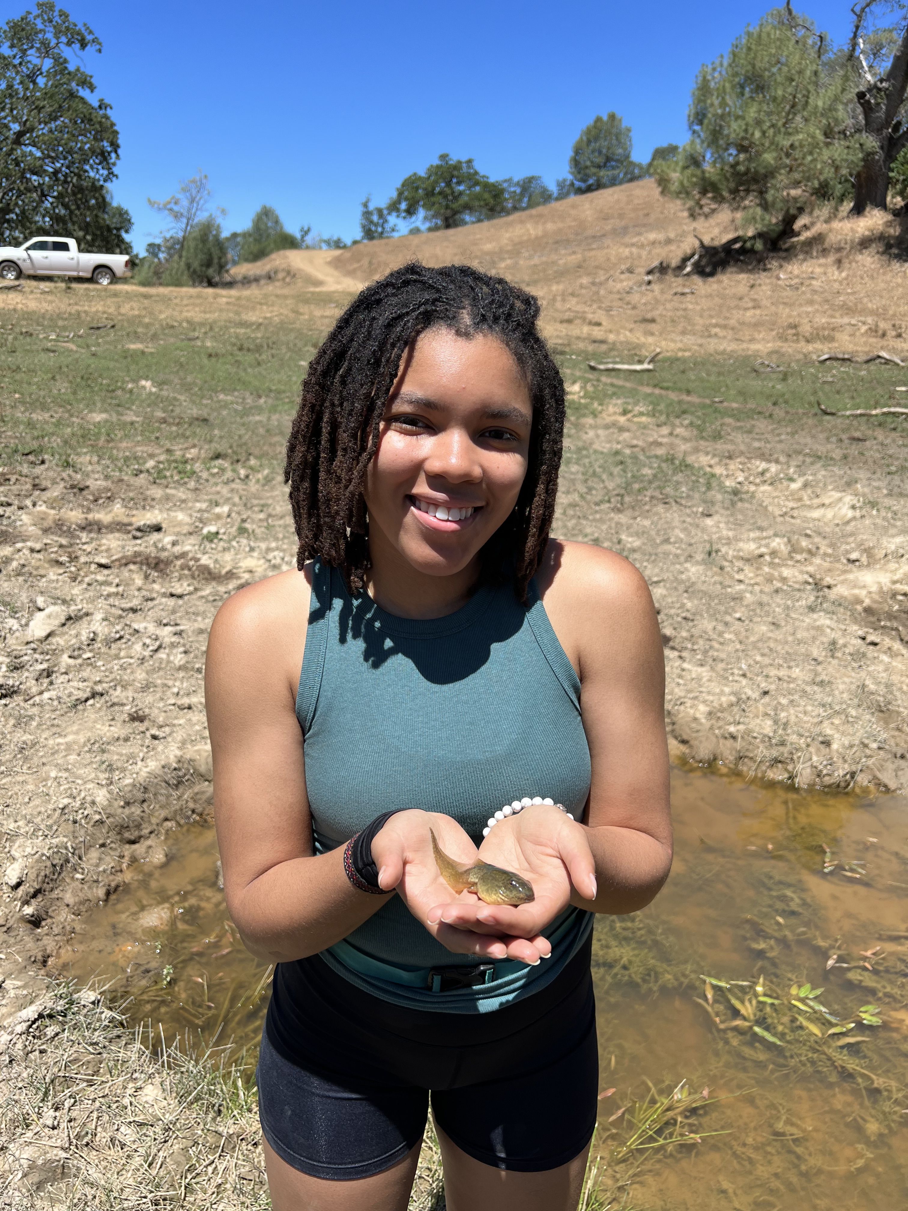 Maya Risin holding a frog
