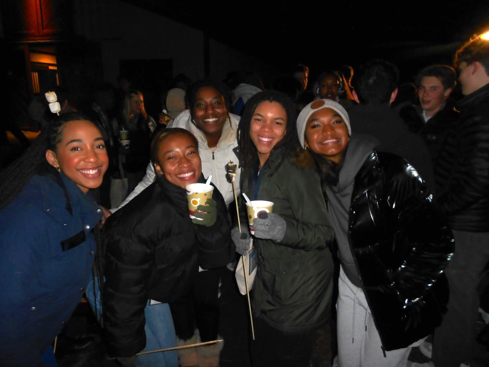 MLK Scholars group picture with hot chocolate