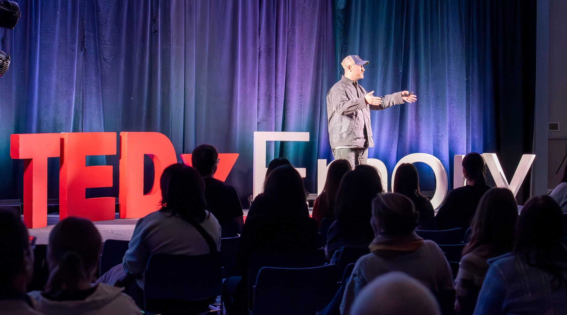 Photo of Josh Luber at TEDx Emory event held in February 2025.