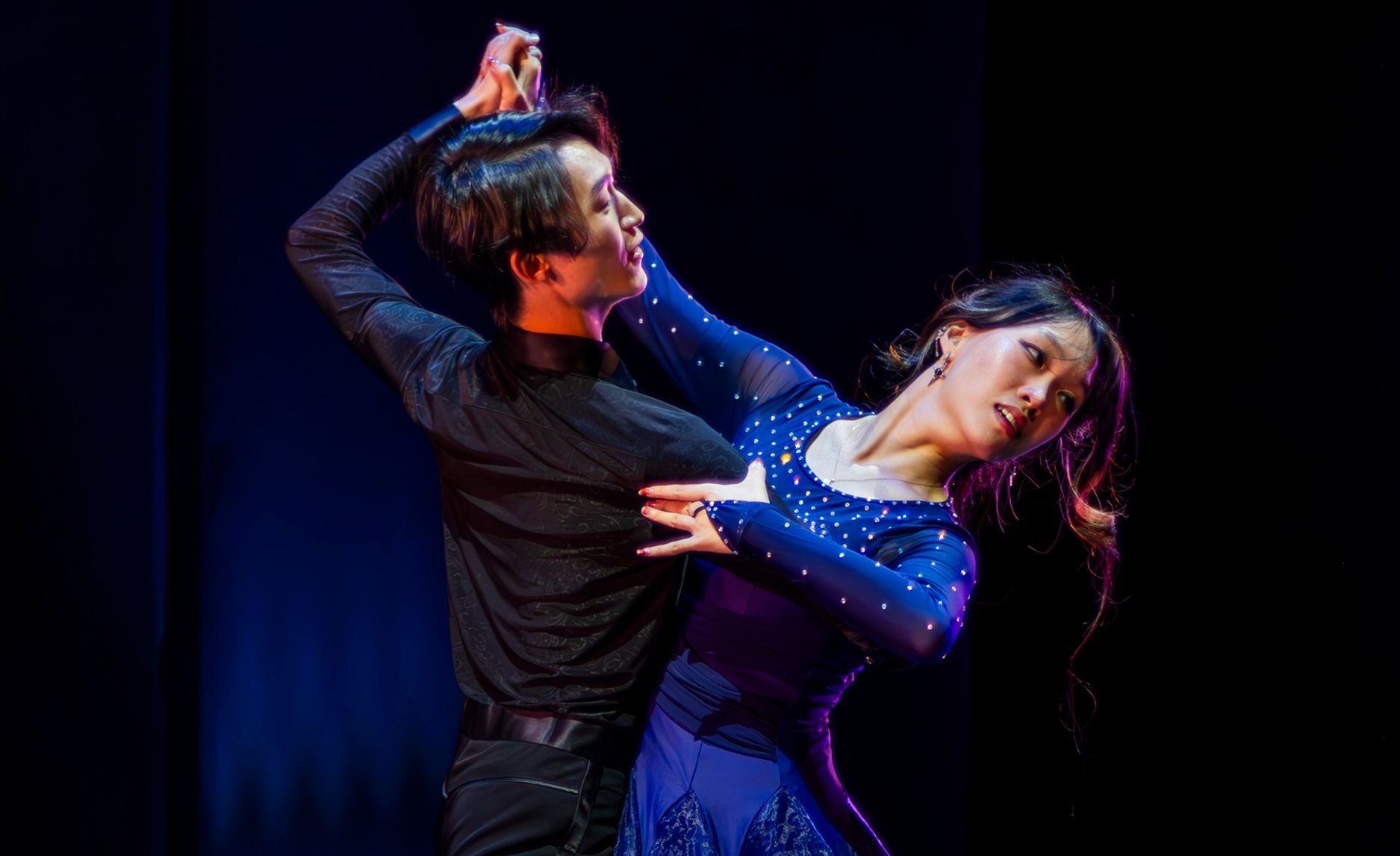 Photo of two Emory students ballroom dancing.