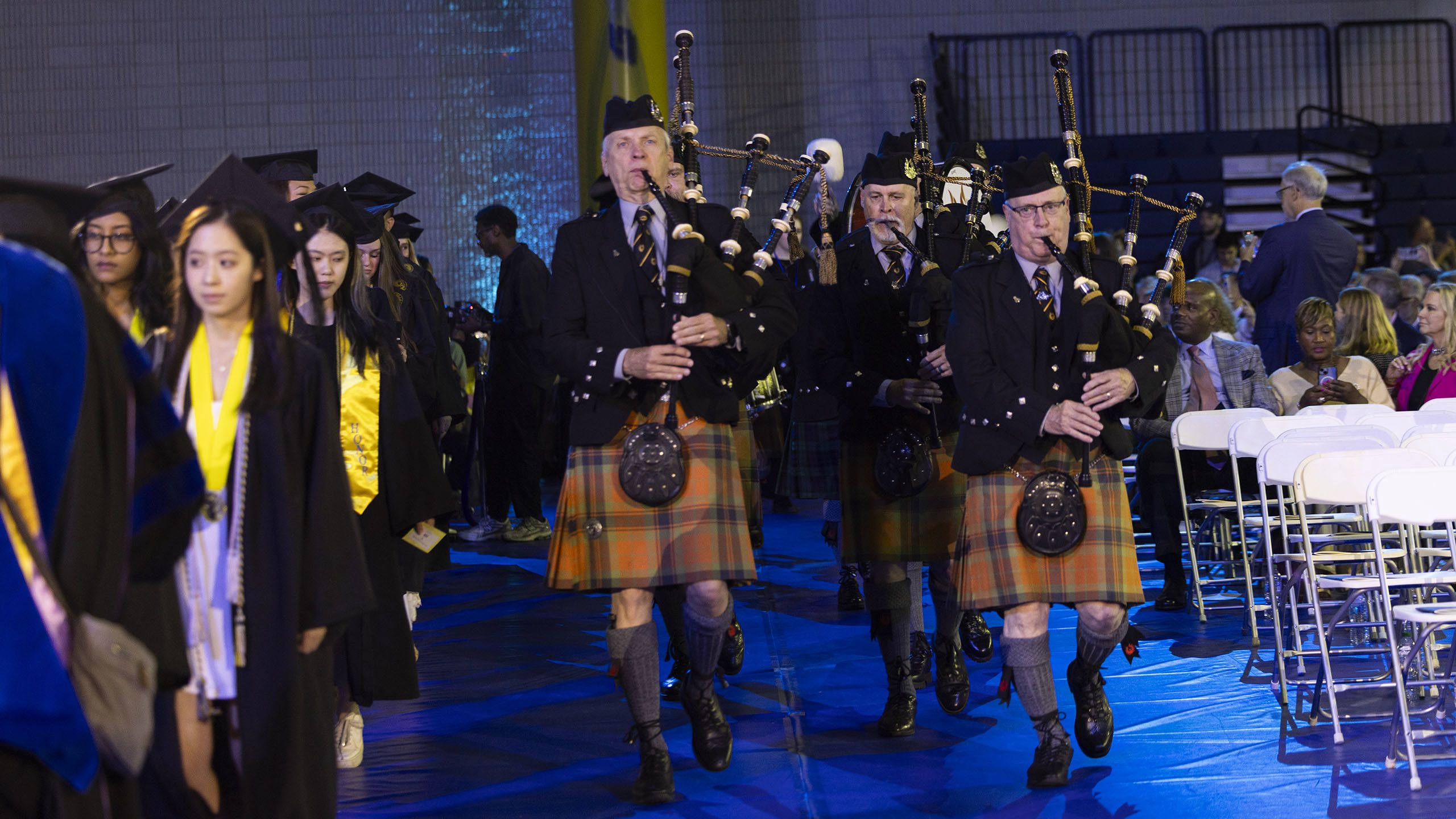 Bag pipers lead the Commencement procession