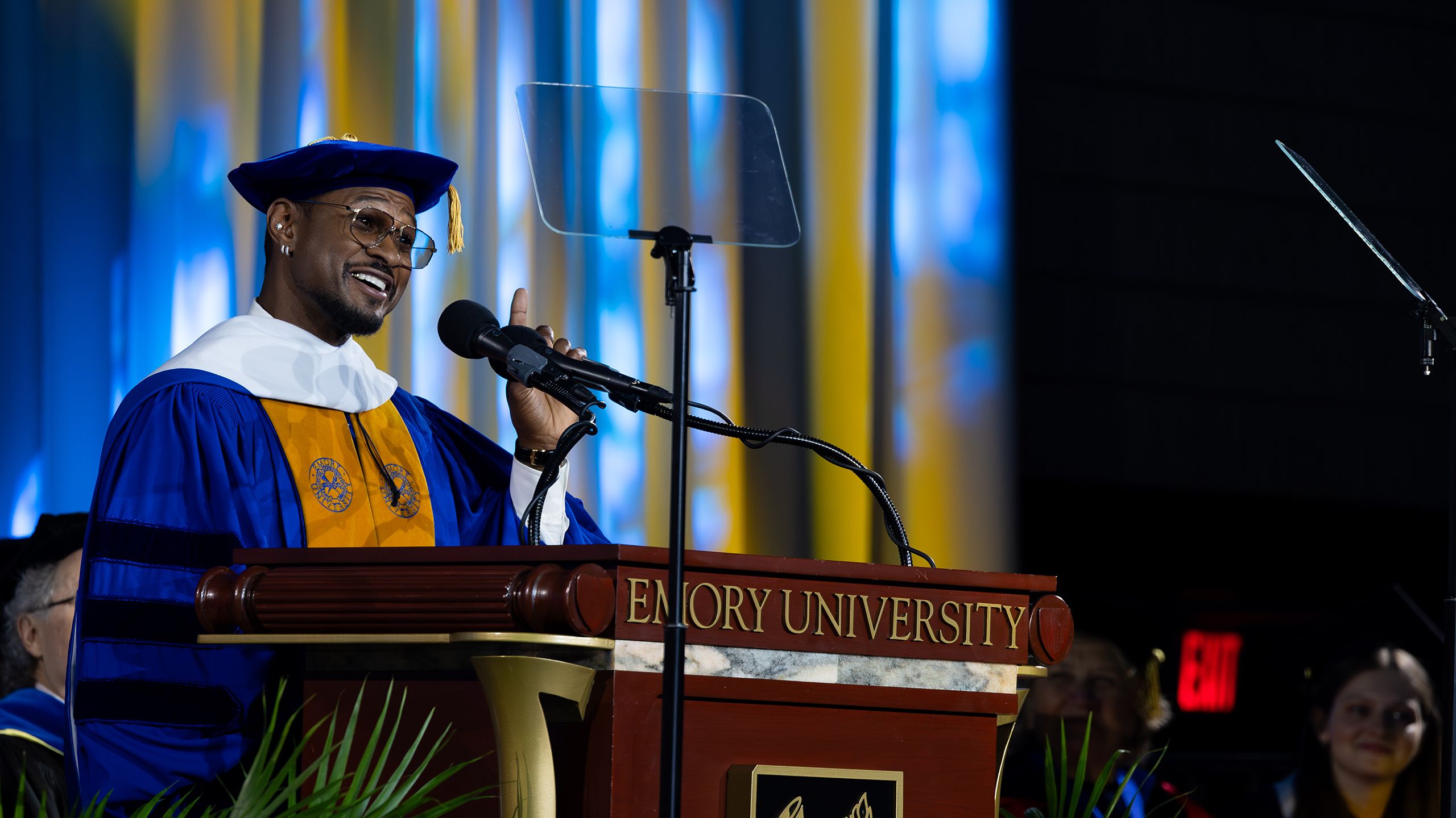 Usher speaks at the Emory podium