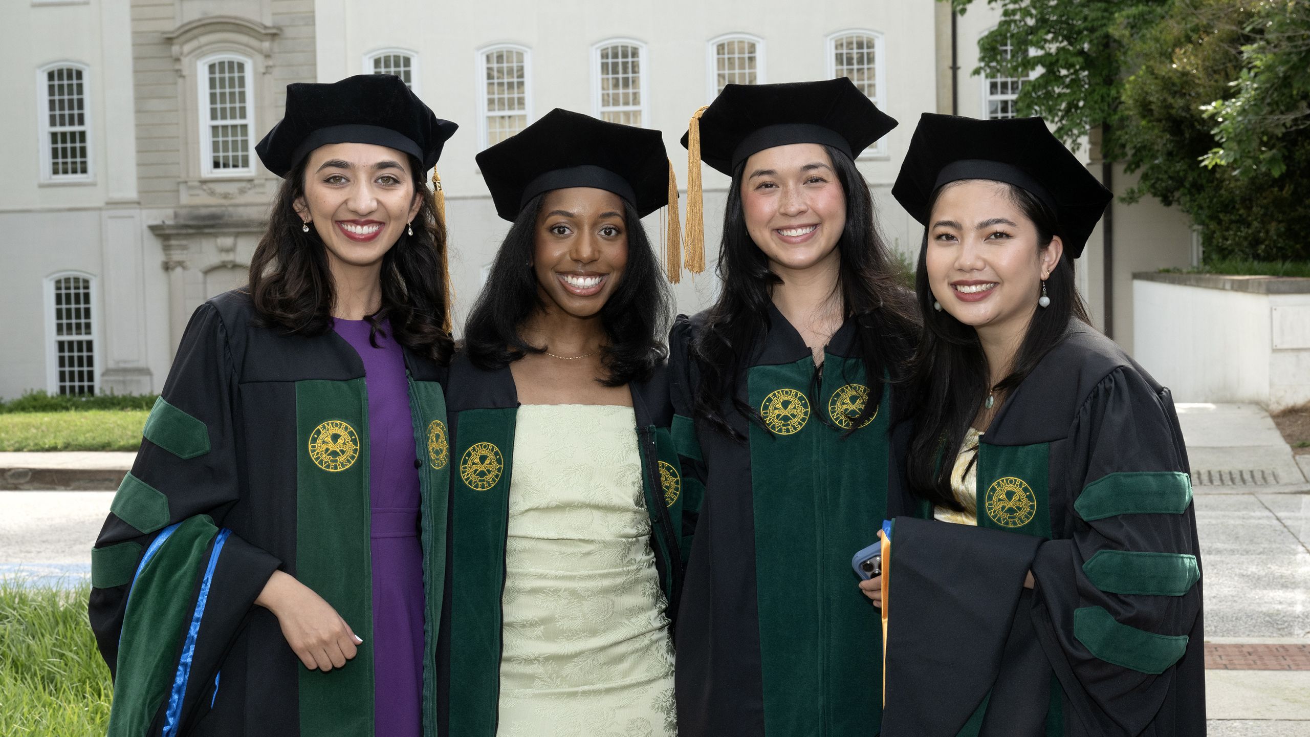 MD candidates pose outside their ceremony