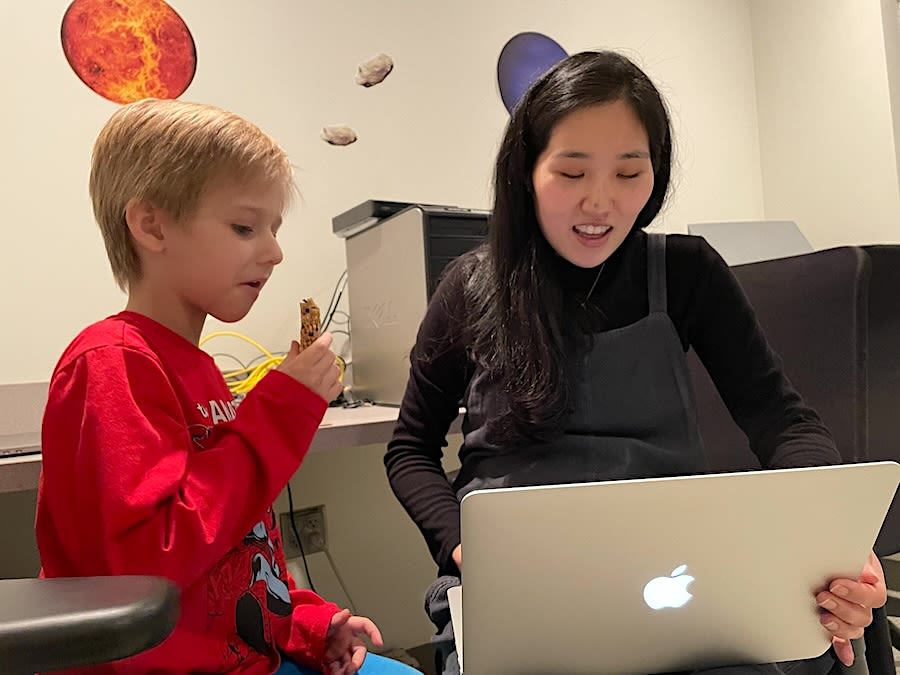 Yaelan Jung and a young study participant