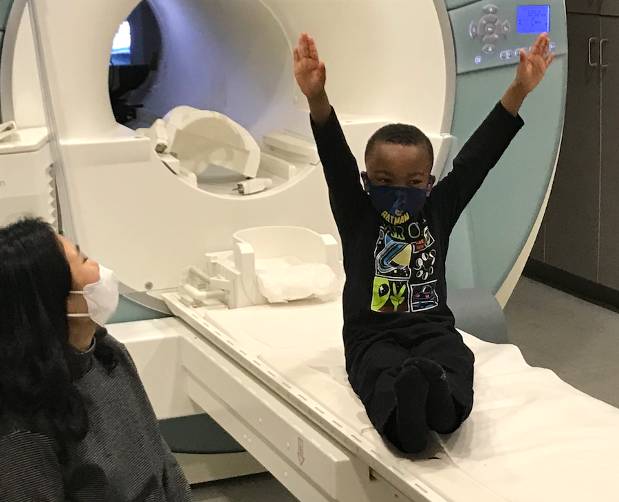 A study participant enjoys the triumphant feeling after completing an experiment.