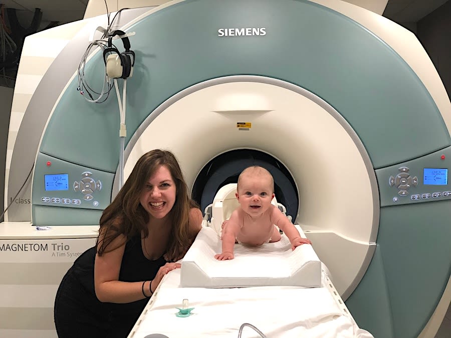 Former Emory PhD student Cassandra Hendrix, shown familiarizing a baby with the fMRI scanner in 2020.