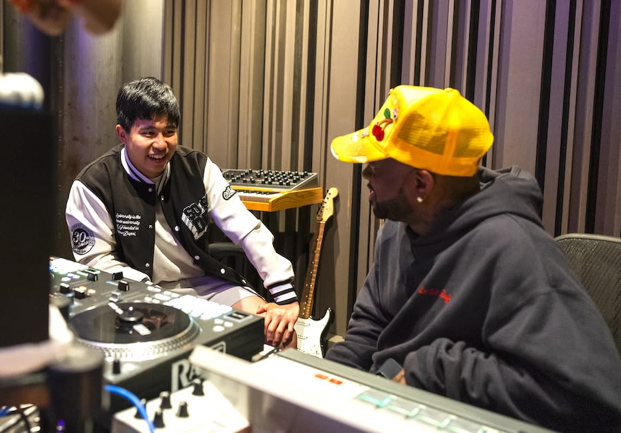 David Qiu sits alongside Jermaine Dupri 