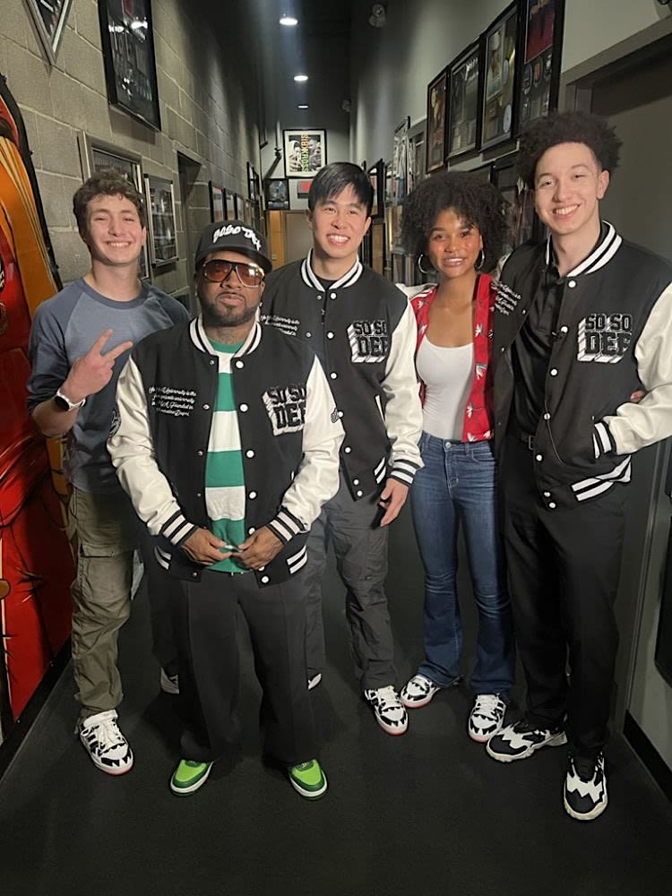 The four Emory interns stand with Jermaine Dupri