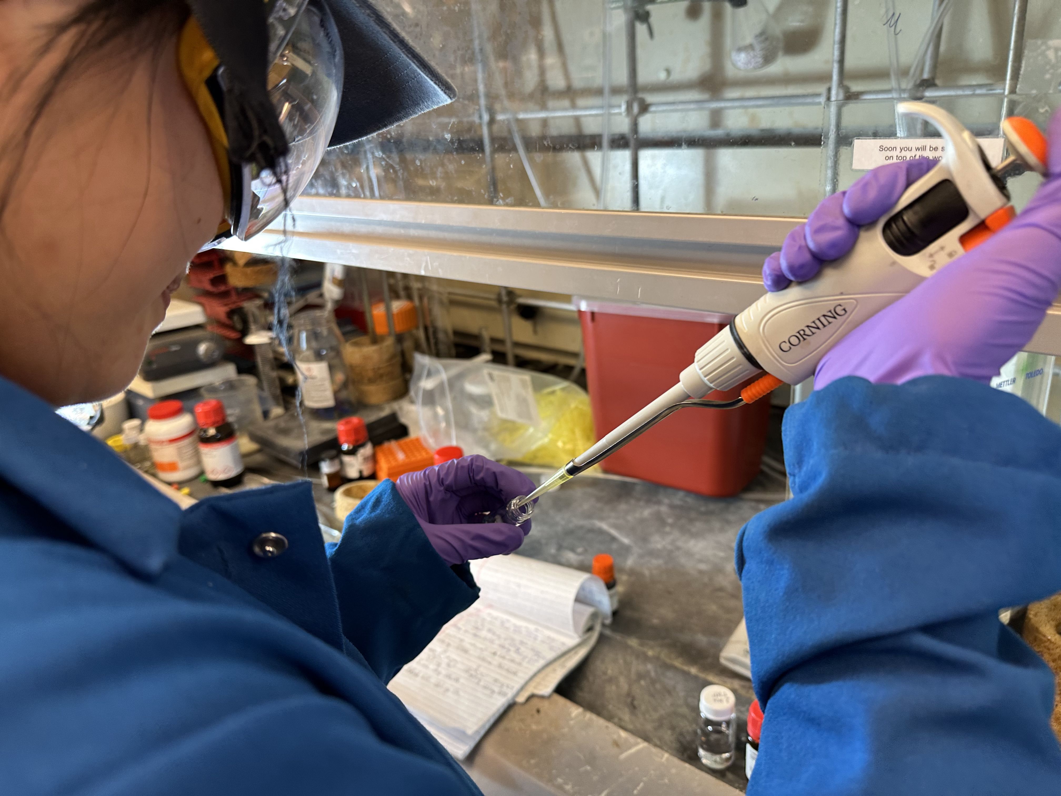 close view of using a pipette in a laboratory