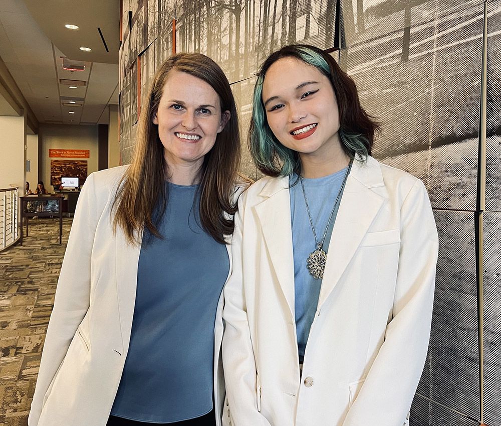 Gwendolynne Reid (left) with her student Amiee Zhao 24Ox 26C at the 2024 Celebration of Scholarship and Creative Expression at Oxford College. Zhao's rhetorical analysis was published in "Young Scholars in Writing: Undergraduate Research in Writing and Rhetoric" in 2024.