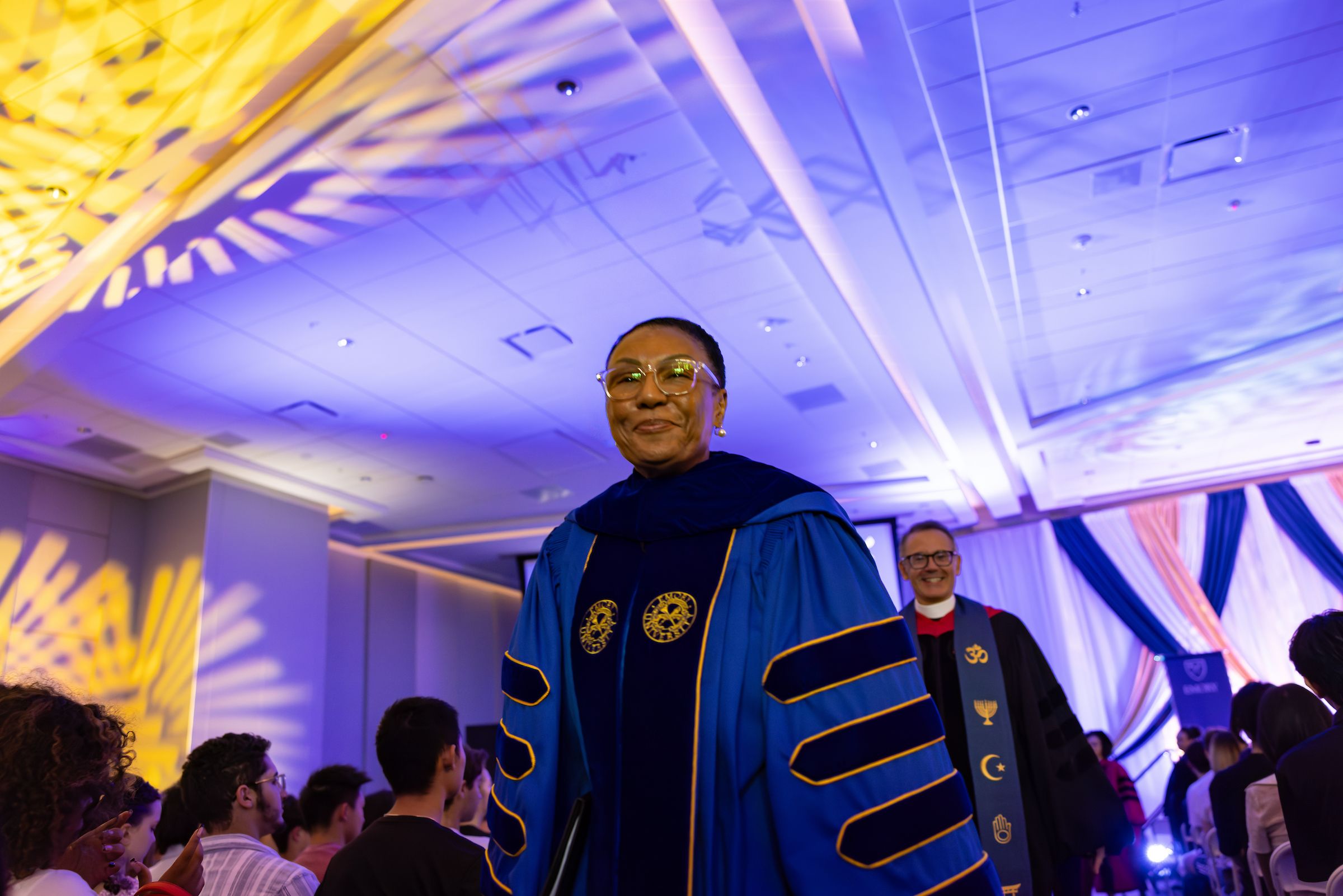 Wearing academic regalia, Leah Ward Sears joins the Convocation procession.