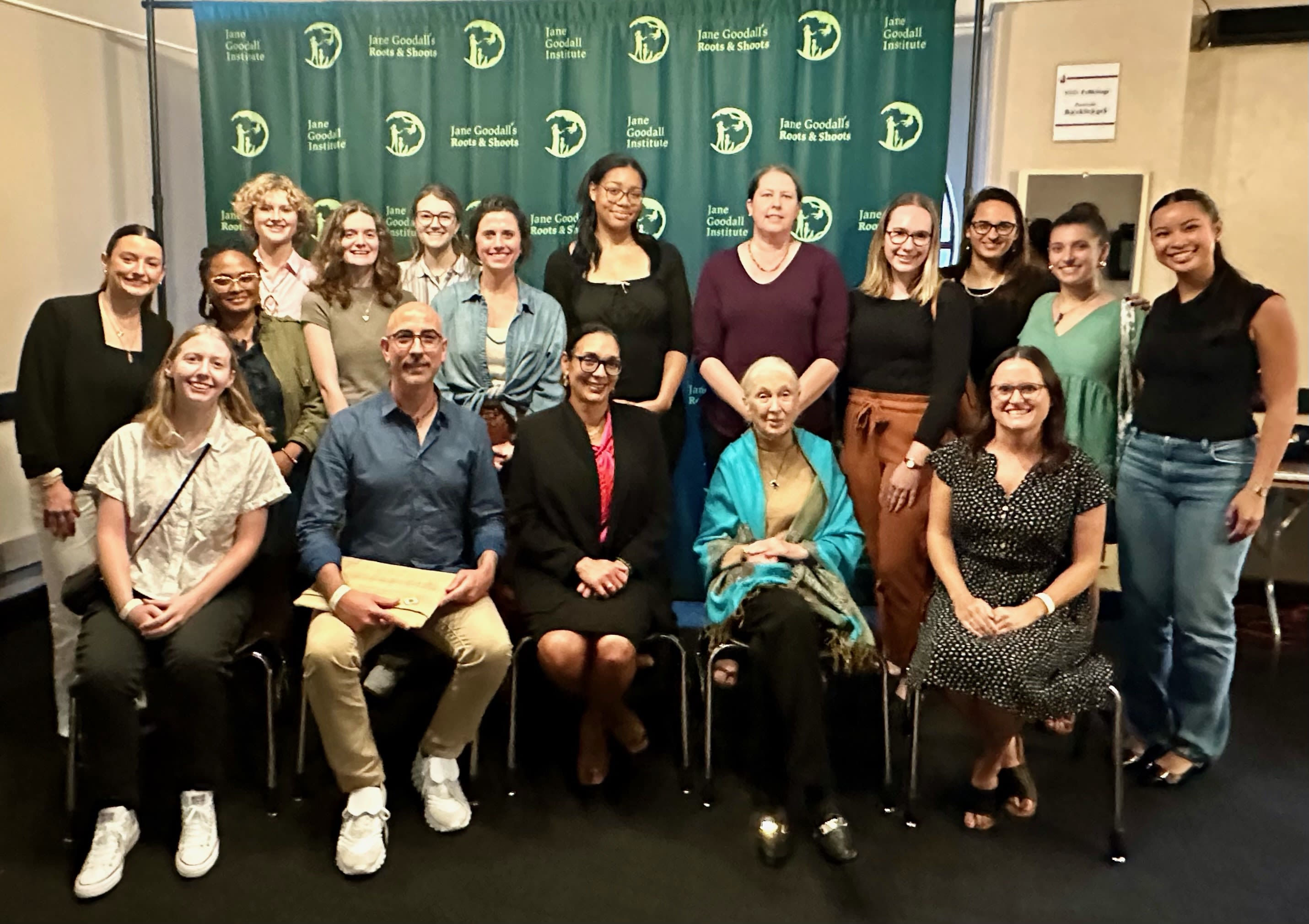 Jane Goodall poses for a photo surrounded by Emory faculty and students.