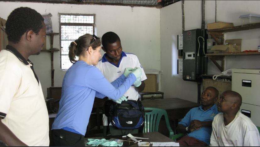 Former Emory graduate student Michele Parsons with staff at Gombe