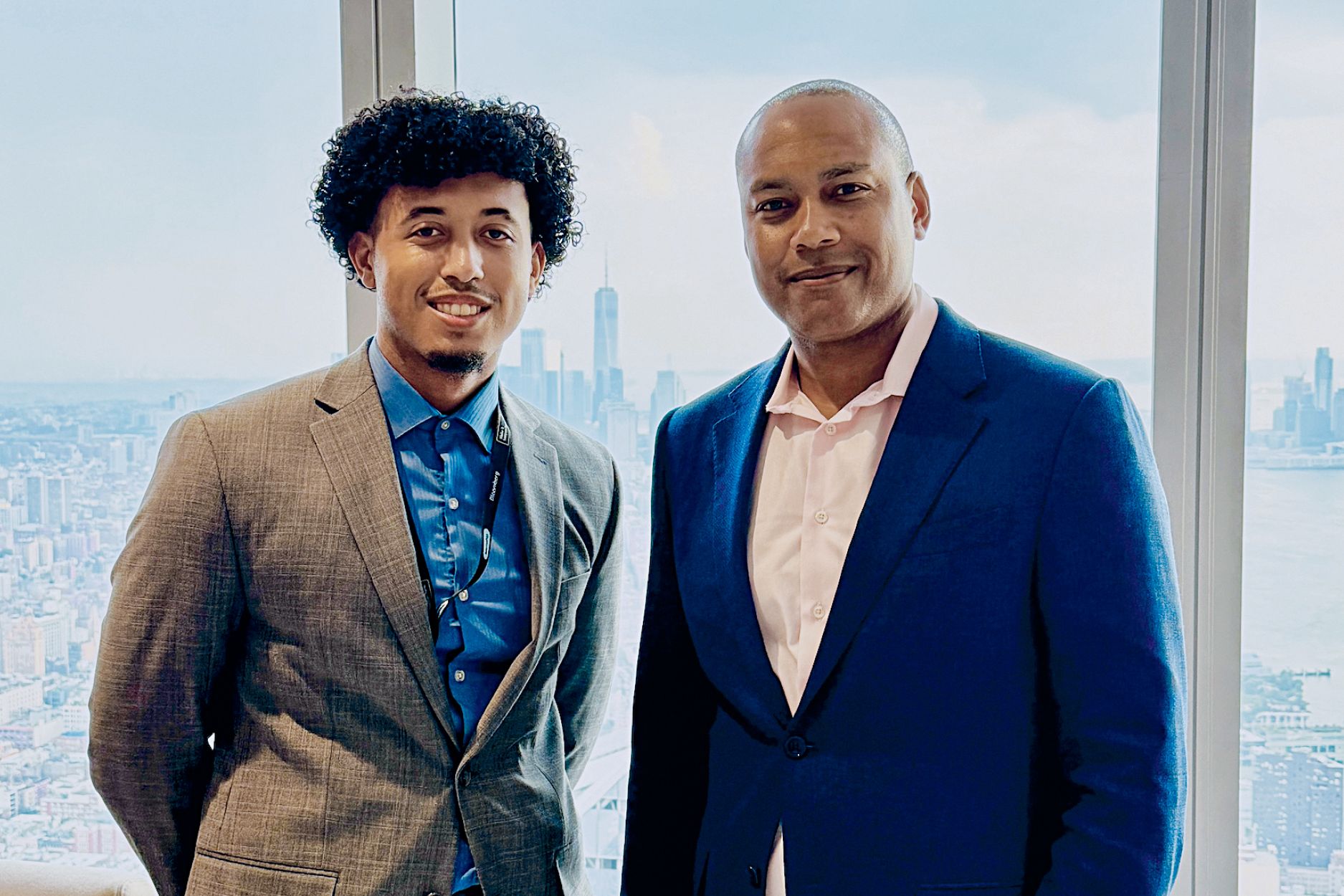 Student Fendy Santos (left) with Chris Lee.