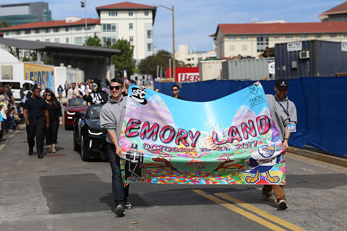 A group of students march in the homecoming parade.