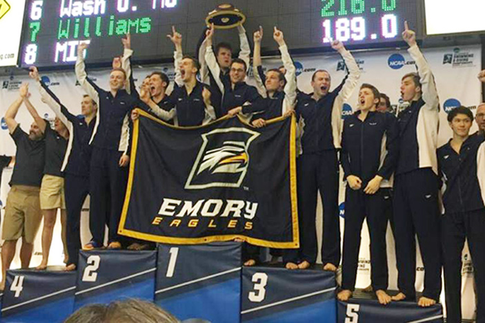 The Emory men's team stands together as the team won its first NCAA title in school history.