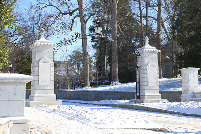 Emory gate coated with snow