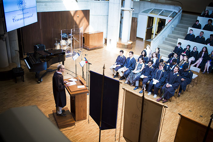 A student speaks to the crowd in Cannon Chapel