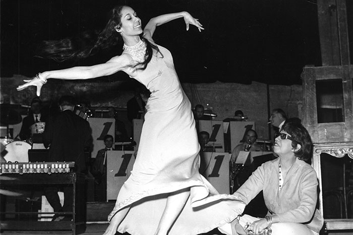 Carmen de Lavallade rehearses a dance while Josephine Baker looks on.