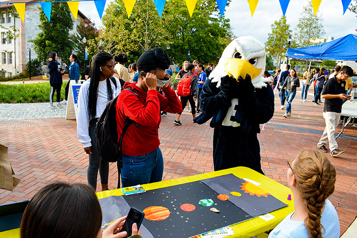 A student interacts with Swoop